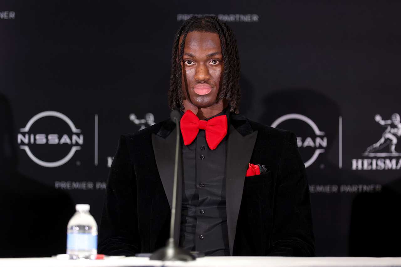 Photos of Ohio State receiver Marvin Harrison Jr. at the Heisman ceremony