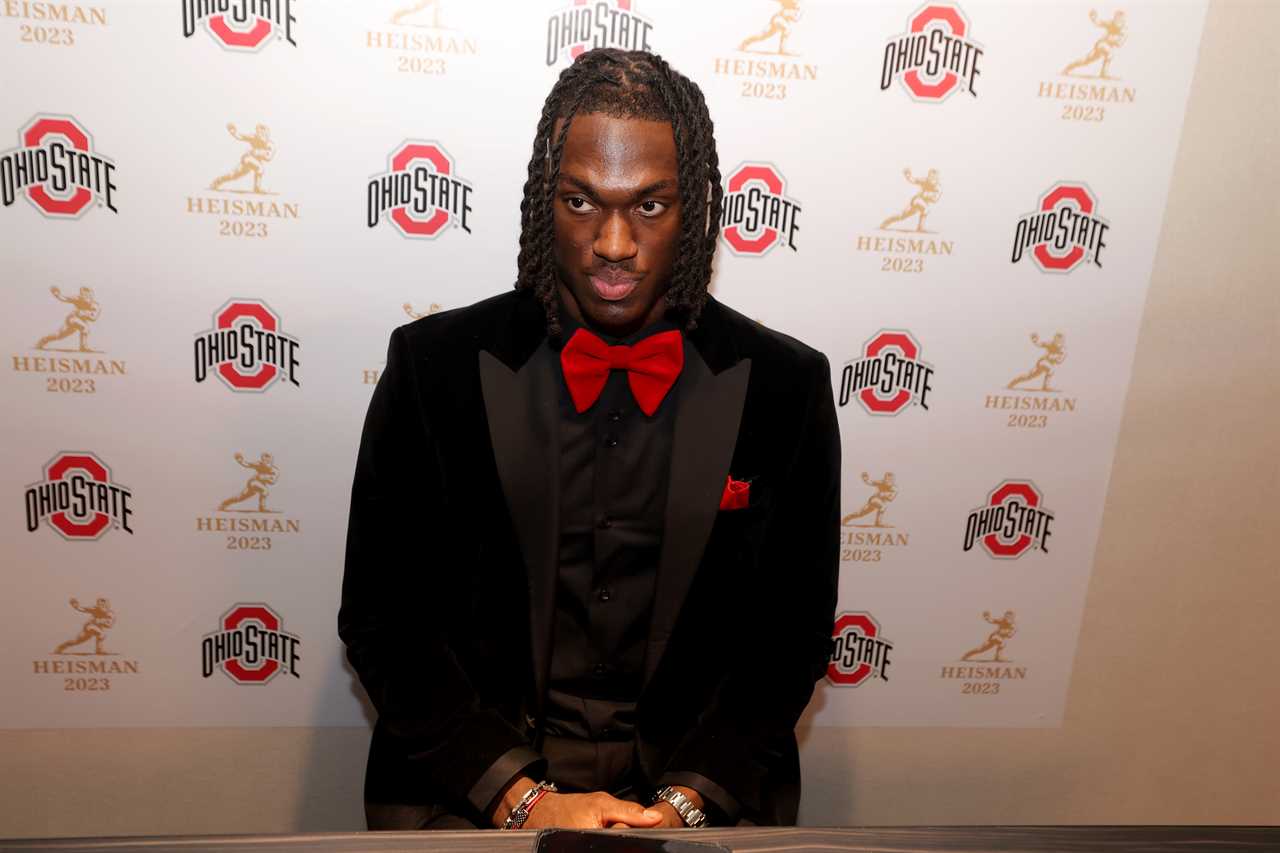 Photos of Ohio State receiver Marvin Harrison Jr. at the Heisman ceremony