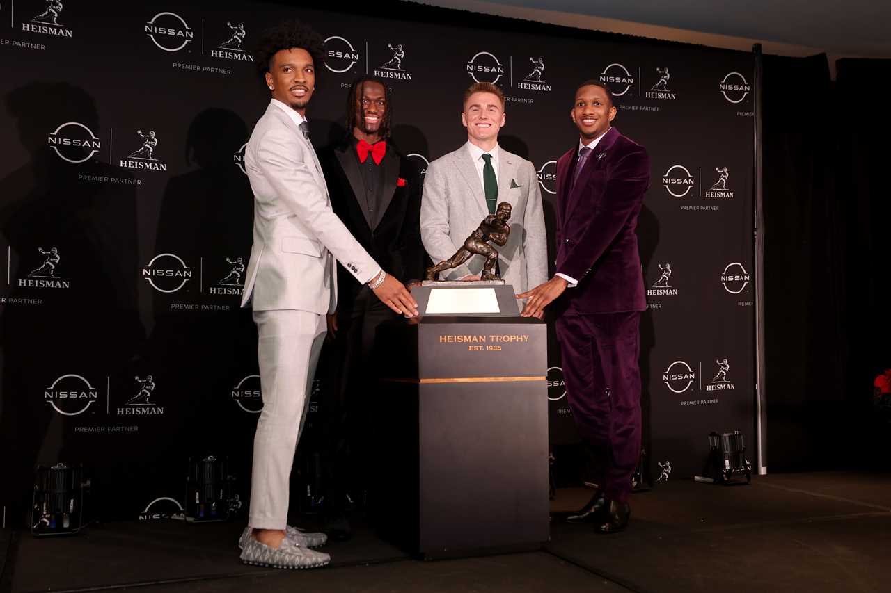 Photos of Ohio State receiver Marvin Harrison Jr. at the Heisman ceremony