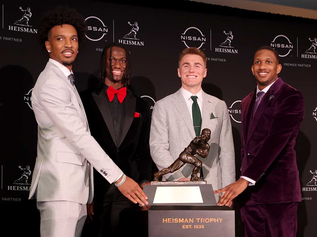 Photos of Ohio State receiver Marvin Harrison Jr. at the Heisman ceremony