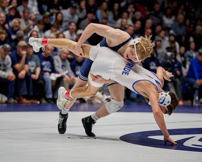 Braeden Davis secures a takedown for Penn State