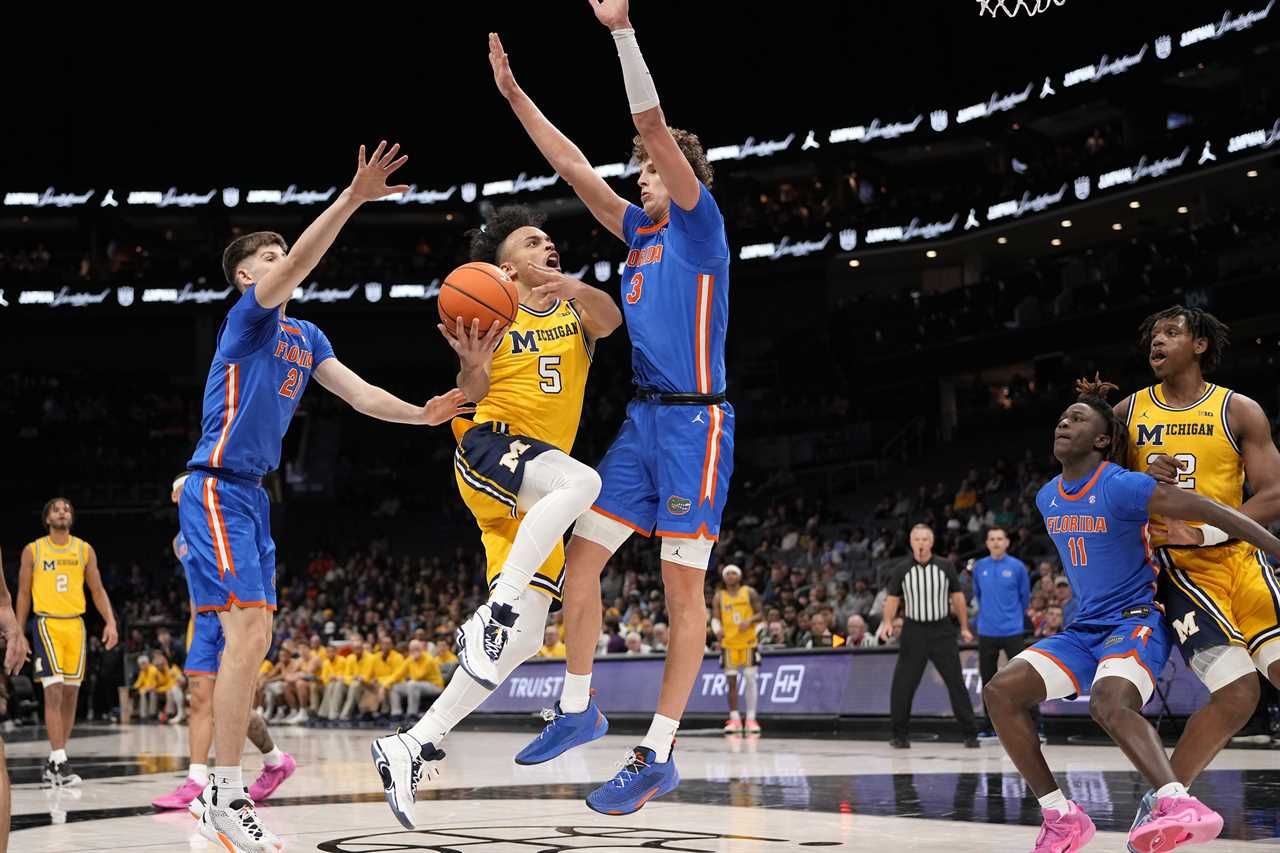 PHOTOS: Highlights from Florida's double-OT win over Michigan Wolverines