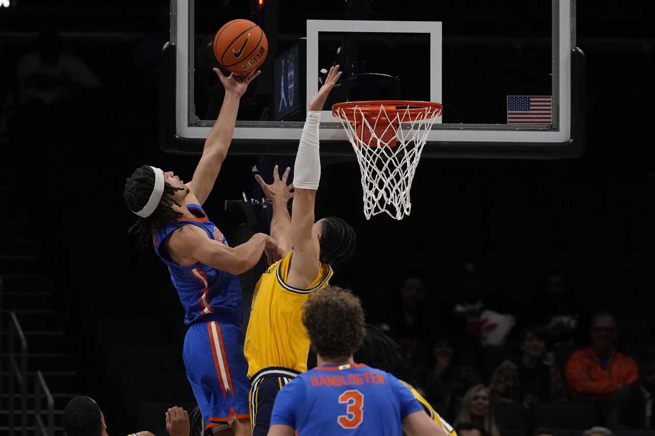 PHOTOS: Highlights from Florida's double-OT win over Michigan Wolverines