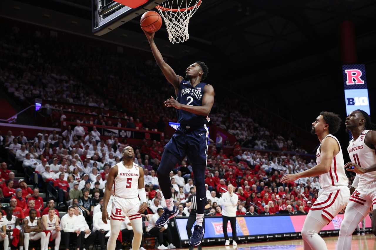 Penn State Nittany Lions guard D’Marco Dunn (2) goes up for a basket during the first half in front of Rutgers Scarlet Knights forward Aundre Hyatt (5) at Jersey Mike’s Arena.