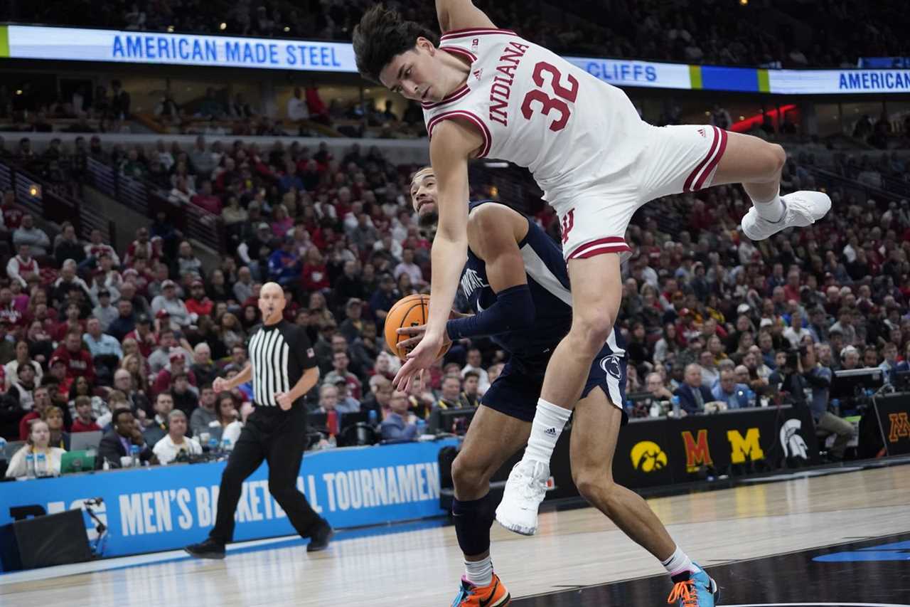 Indiana Hoosiers guard Trey Galloway (32) defends Penn State Nittany Lions guard Seth Lundy (1) during the second half at United Center.