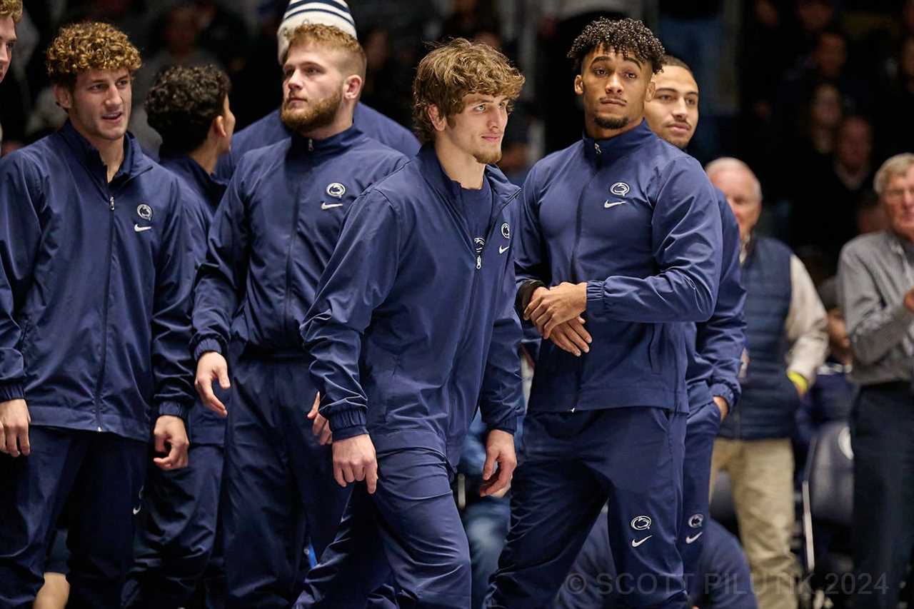 The PSU wrestling team lines up before the match.