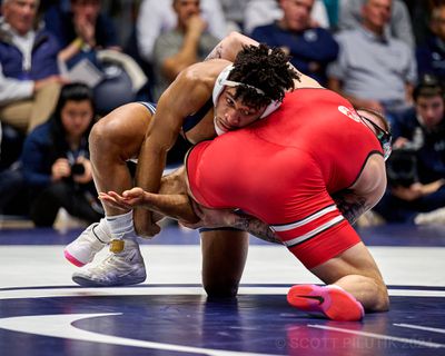 Carter Starocci patiently works towards finishing a takedown against #11 Rocco Welsh