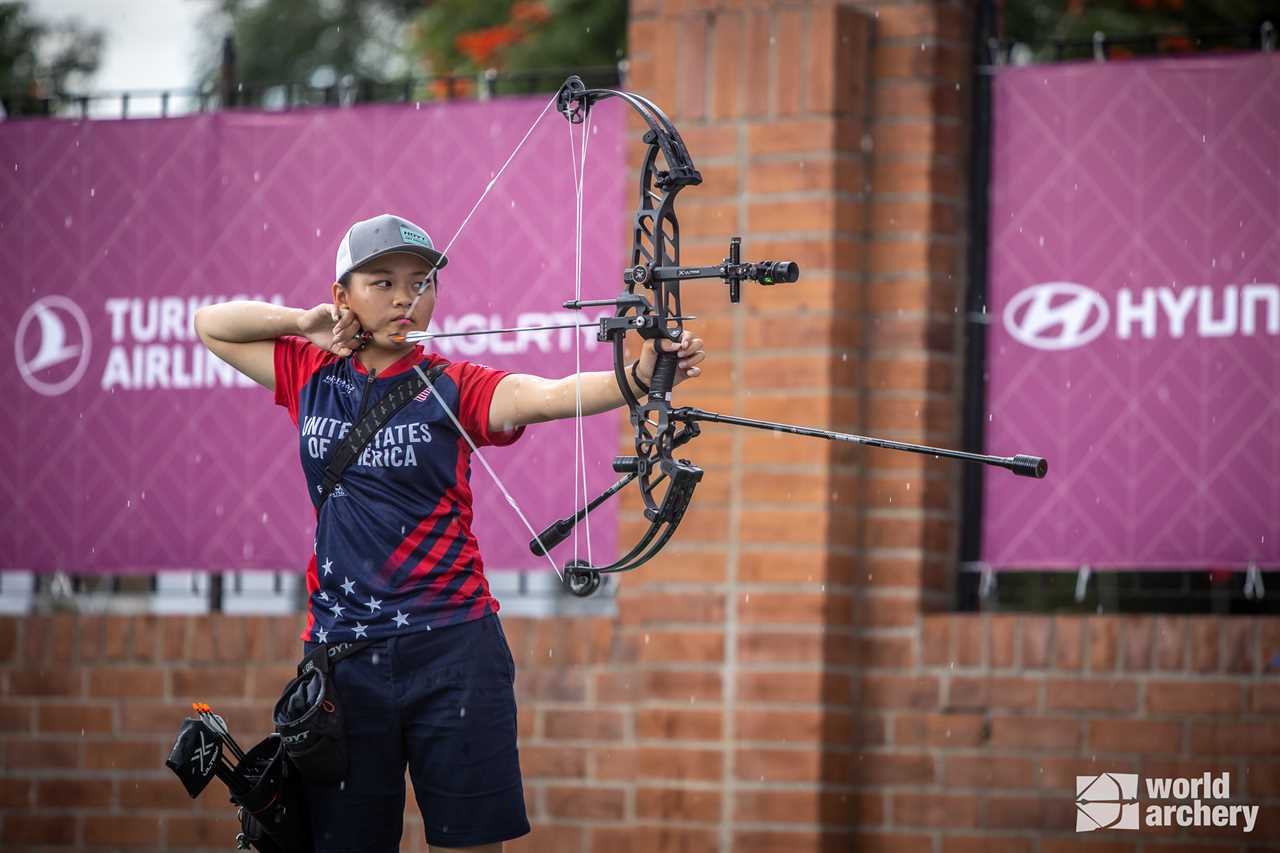 Liko Arreola shooting her bow in the rain in Colombia.