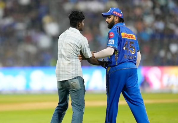 IPL 2024: Rohit Sharma startled as fan invades pitch and hugs him, watch viral video
